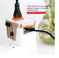 Merkloos Universele Wereldstekker Met 4 USB Poorten - Internationale Reisstekker Voor 150+ Landen-Australië - Zuid Amerika-Engeland (UK) - Amerika (USA) - Reis Adapter - Wereld Stekker - Oplader – Wit Met Grijs -Voyago Winkel 1200x1183 11