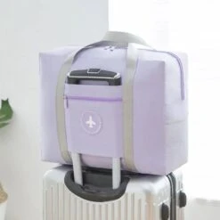 Merkloos Opvouwbare Reistas Paars/Lila - Opbergtas - Weekendtas - Reistas Voor Handbagage - Opvouwbare Reistassen Dames - Reistas Voor Op Koffer - Dames Tas - Damestas - Tas Voor Reizen - Sporttas -Voyago Winkel 1200x1200 2752
